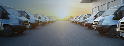 Fleet of commercial vans in car park