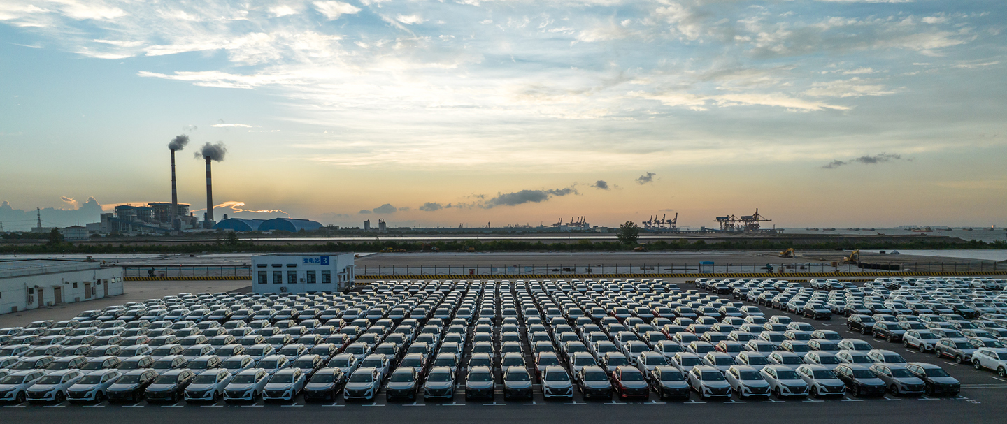 Large car park full of cars representing fleet operator